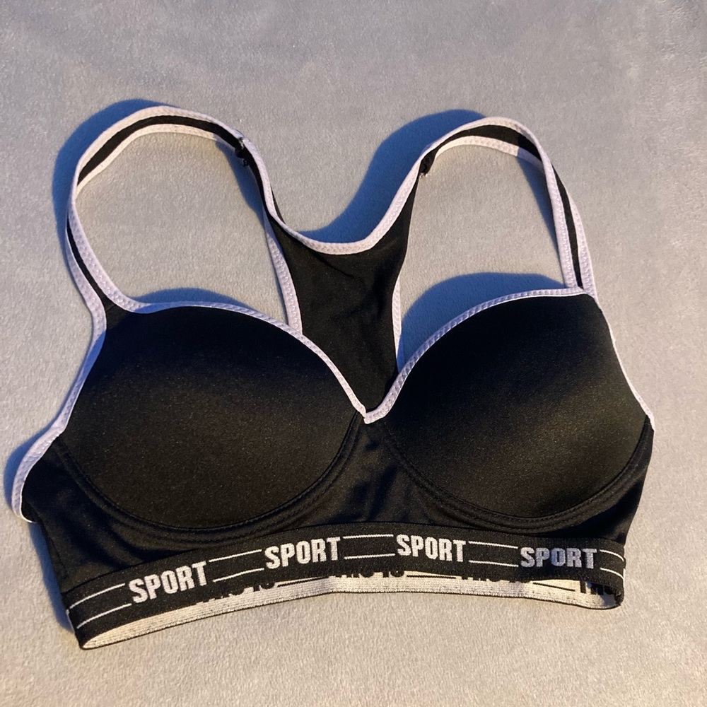 Black sports bra with padding and waistband